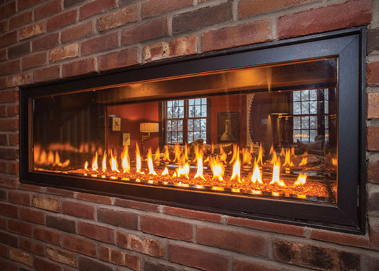 Fireplace with brick surround.